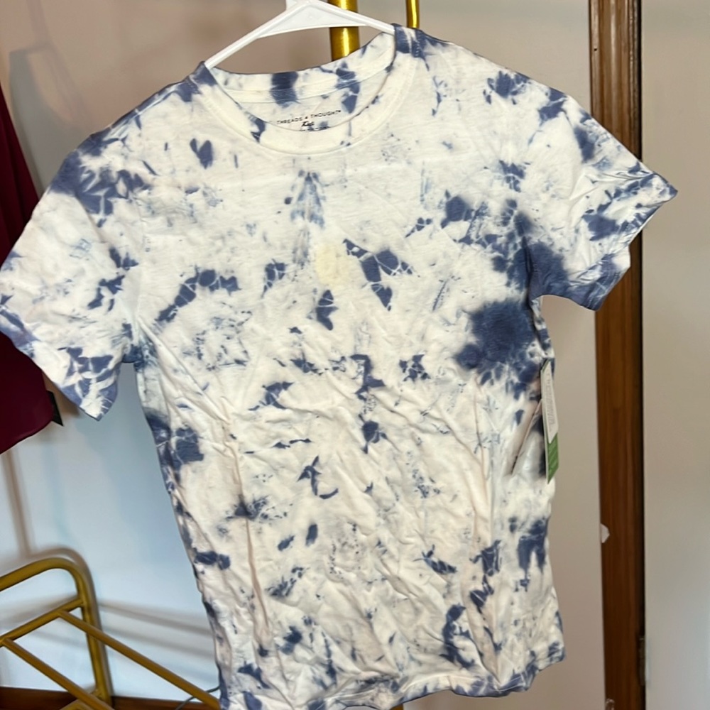 Tie die boys t shirt size 12. Runs small. Never worn